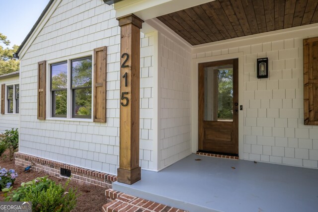 215 Holman Ave, Athens, GA 30606 - doorway to property featuring crawl space and covered porch