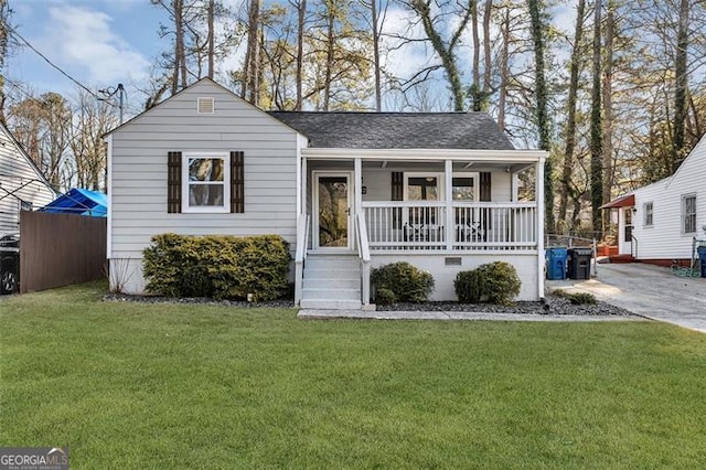 2912 Palm Dr, East Point, GA 30344 - view of front of house featuring a porch and roof with shingles