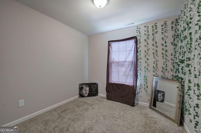 230 Louise Ln, Calhoun, GA 30701 - unfurnished room featuring carpet floors and baseboards