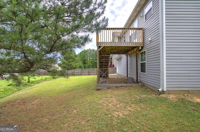 230 Louise Ln, Calhoun, GA 30701 - fenced backyard featuring a wooden deck and stairs