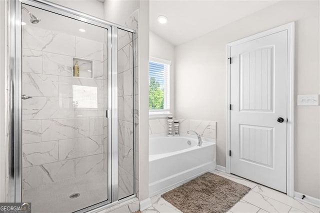 361 Traditions Ln, Hampton, GA 30228 - bathroom with marble look tile flooring, a bath, a shower stall, recessed lighting, and baseboards