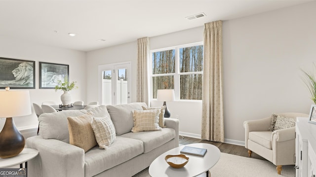 314 Sound Cir, Stockbridge, GA 30281 - living area featuring wood finished floors and baseboards