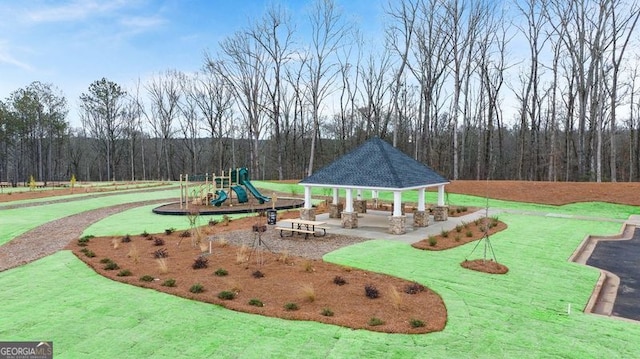 314 Sound Cir, Stockbridge, GA 30281 - communal playground featuring a gazebo and a wooded view