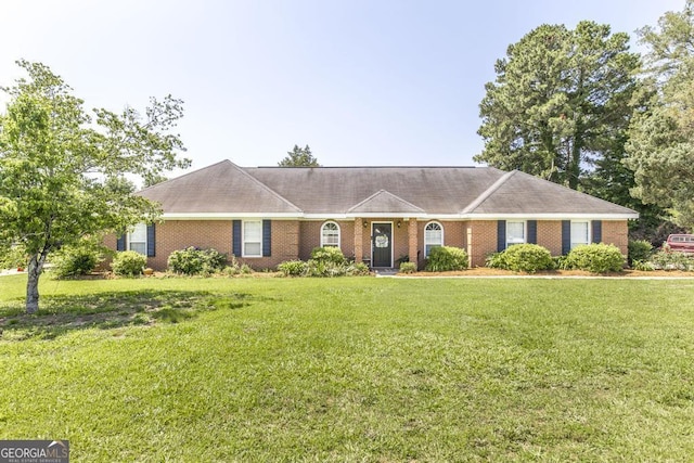 322 Smithville Church Rd, Warner Robins, GA 31088 - single story home featuring a front lawn and brick siding