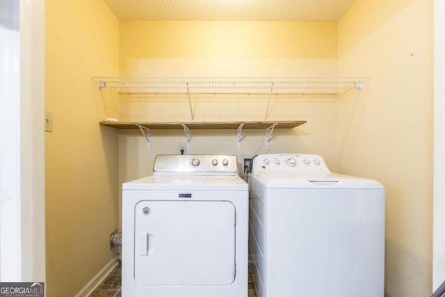 322 Smithville Church Rd, Warner Robins, GA 31088 - laundry room with washing machine and clothes dryer and baseboards