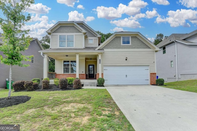 7760 Hansel Ln, Lithonia, GA 30058 - craftsman-style house featuring brick siding, covered porch, a front lawn, and concrete driveway