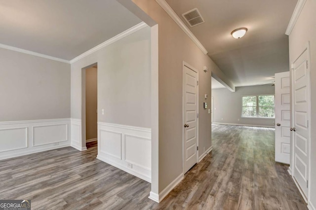 7760 Hansel Ln, Lithonia, GA 30058 - corridor with wood finished floors, crown molding, and wainscoting