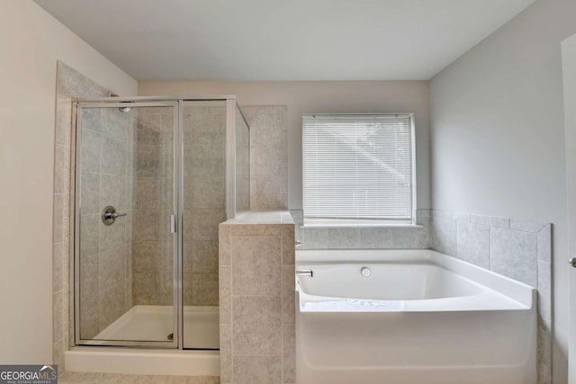 7760 Hansel Ln, Lithonia, GA 30058 - bathroom with a bath and a stall shower