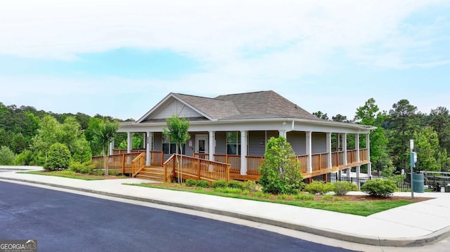 7760 Hansel Ln, Lithonia, GA 30058 - farmhouse inspired home with covered porch and a shingled roof