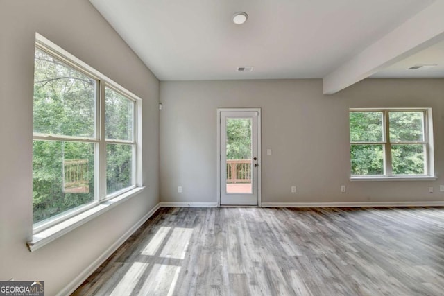 7760 Hansel Ln, Lithonia, GA 30058 - spare room featuring wood finished floors and baseboards