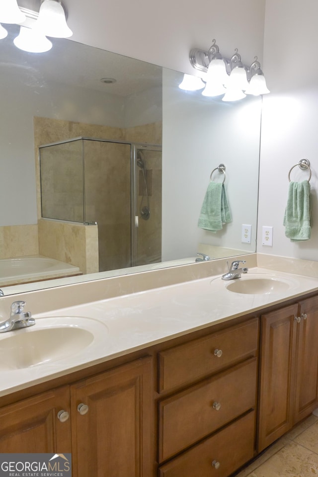 276 Laurel Landing Blvd, Kingsland, GA 31548 - full bath with double vanity, a stall shower, and a garden tub