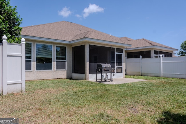 276 Laurel Landing Blvd, Kingsland, GA 31548 - rear view of house with a sunroom and a shingled roof