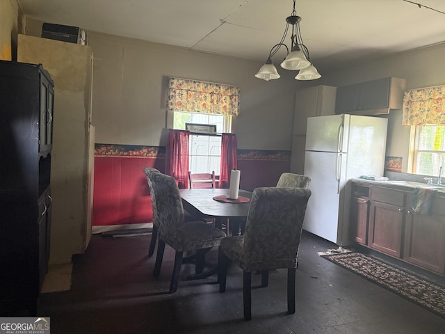 7779 Mill St SW, Cave Spring, GA 30124 - dining room with concrete flooring