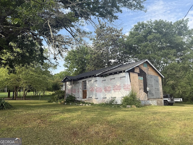 7779 Mill St SW, Cave Spring, GA 30124 - view of property exterior with a yard