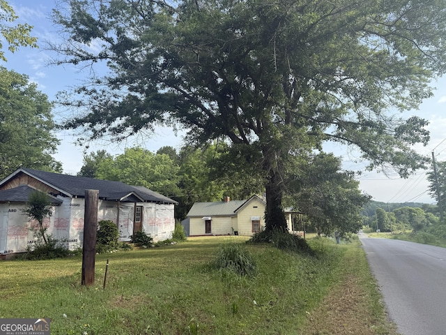 7779 Mill St SW, Cave Spring, GA 30124 - view of front of house featuring a front yard