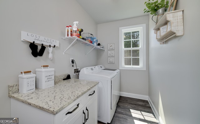 433 Wilson Dr, Mcdonough, GA 30252 - laundry room with washer and clothes dryer, dark wood-style flooring, and cabinet space
