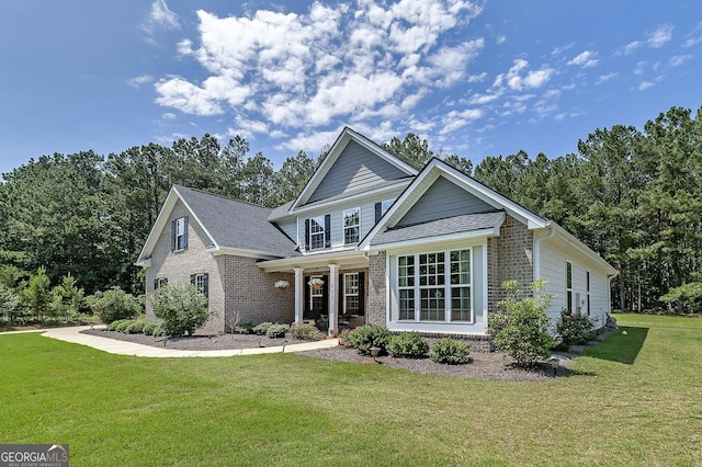 433 Wilson Dr, Mcdonough, GA 30252 - view of front facade with brick siding and a front lawn