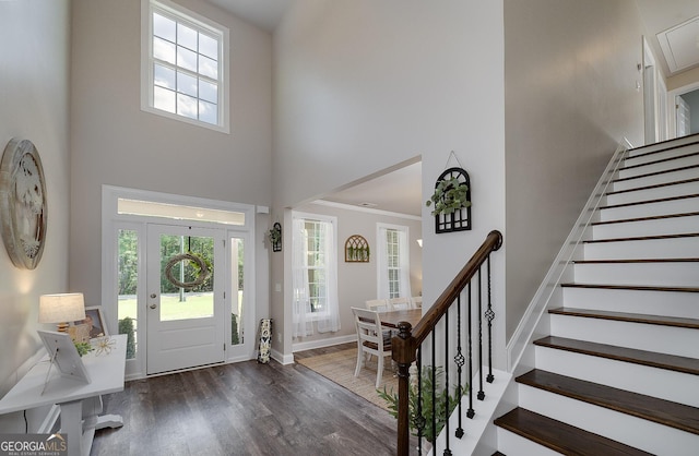 433 Wilson Dr, Mcdonough, GA 30252 - foyer entrance with a towering ceiling, wood finished floors, and stairway
