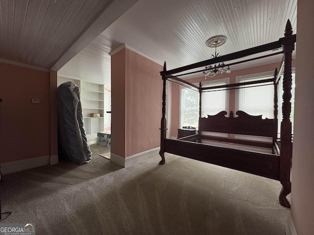 435 Jackson St, Locust Grove, GA 30248 - bedroom featuring carpet floors, baseboards, ornamental molding, a chandelier, and wooden ceiling
