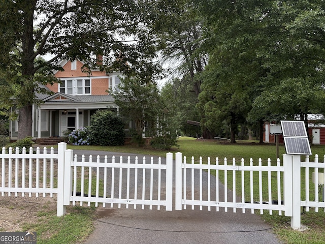 435 Jackson St, Locust Grove, GA 30248 - obstructed view of property featuring a porch