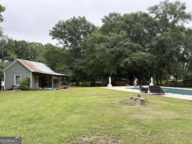 435 Jackson St, Locust Grove, GA 30248 - view of green lawn with a covered pool