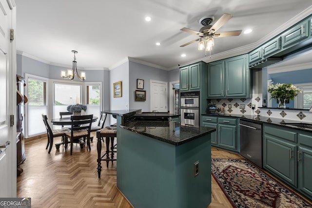 1703 Brandywine Ct, Dunwoody, GA 30338 - kitchen featuring appliances with stainless steel finishes, green cabinetry, healthy amount of natural light, recessed lighting, and ornamental molding