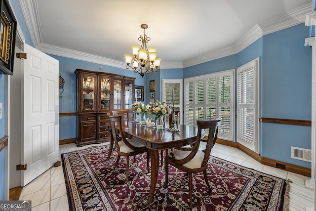 1703 Brandywine Ct, Dunwoody, GA 30338 - dining room featuring a chandelier, light tile patterned floors, and crown molding