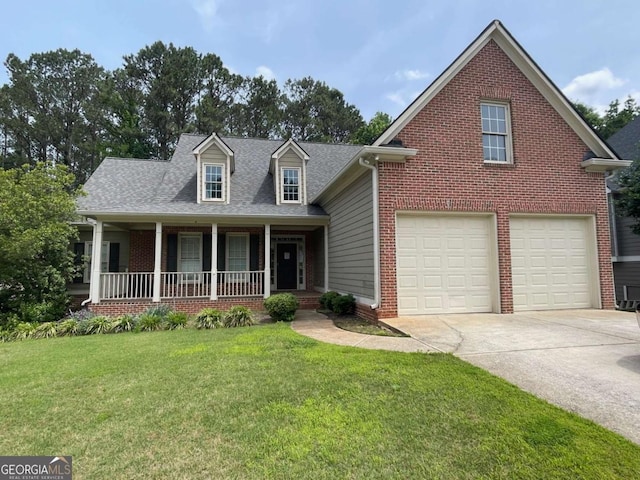 429 Bentleaf Dr, Dallas, GA 30132 - view of front of home with covered porch, driveway, brick siding, a front yard, and an attached garage