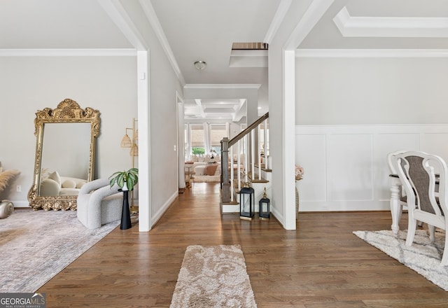 3998 Commodore Dr, Atlanta, GA 30341 - foyer entrance featuring ornamental molding, stairway, a decorative wall, wood finished floors, and a wainscoted wall