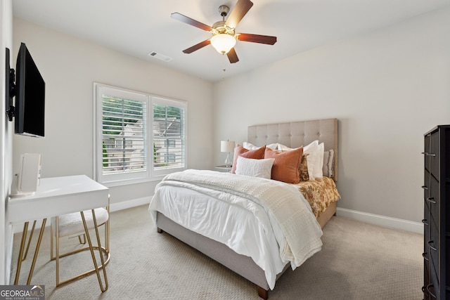 3998 Commodore Dr, Atlanta, GA 30341 - bedroom featuring light colored carpet, baseboards, and a ceiling fan