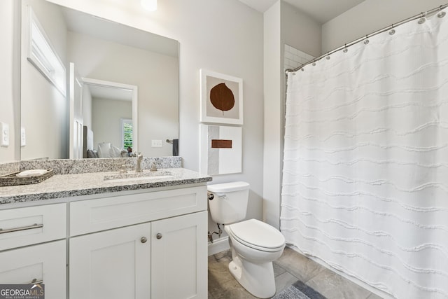 3998 Commodore Dr, Atlanta, GA 30341 - full bathroom featuring toilet, vanity, and a shower with shower curtain