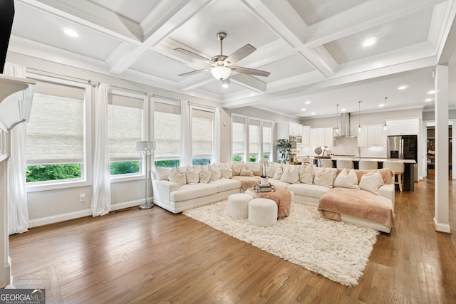 3998 Commodore Dr, Atlanta, GA 30341 - living area with ceiling fan, plenty of natural light, wood finished floors, coffered ceiling, and beamed ceiling