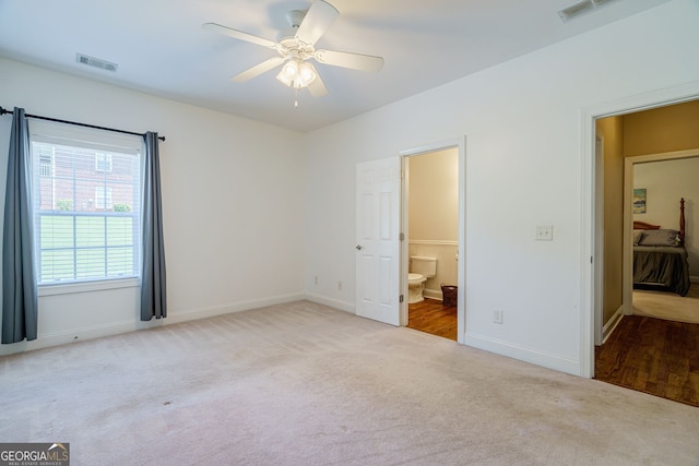 1621 White Oak Cv, Loganville, GA 30052 - unfurnished bedroom featuring carpet floors, baseboards, and ensuite bath