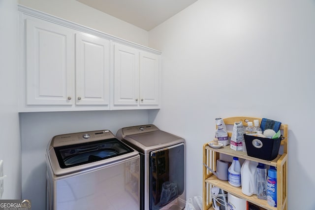 1621 White Oak Cv, Loganville, GA 30052 - laundry area with independent washer and dryer and cabinet space