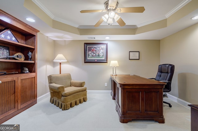 1621 White Oak Cv, Loganville, GA 30052 - office area featuring ornamental molding, a tray ceiling, light carpet, a ceiling fan, and baseboards