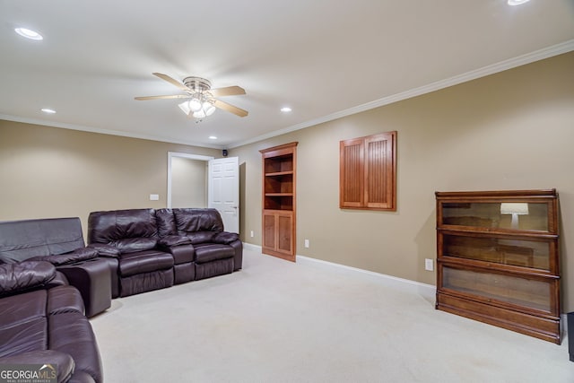 1621 White Oak Cv, Loganville, GA 30052 - living room with ceiling fan, light carpet, crown molding, recessed lighting, and baseboards
