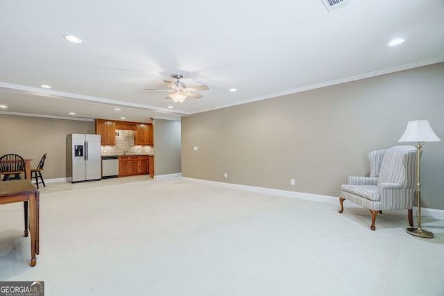 1621 White Oak Cv, Loganville, GA 30052 - unfurnished room featuring recessed lighting, ceiling fan, baseboards, ornamental molding, and light carpet