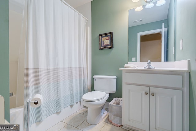 1621 White Oak Cv, Loganville, GA 30052 - bathroom with vanity, toilet, tile patterned floors, and shower / tub combo