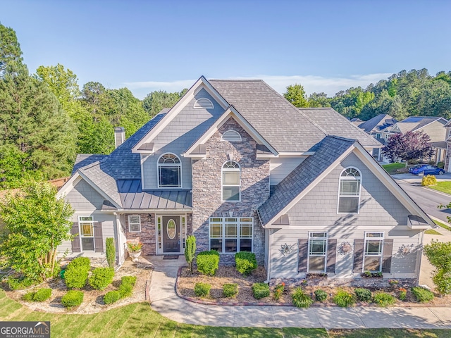 100 Harmony Ct, Dallas, GA 30157 - craftsman inspired home with stone siding, a chimney, and a standing seam roof
