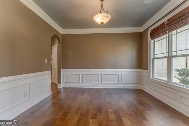 100 Harmony Ct, Dallas, GA 30157 - empty room featuring ornamental molding, arched walkways, a wainscoted wall, and dark wood-style flooring