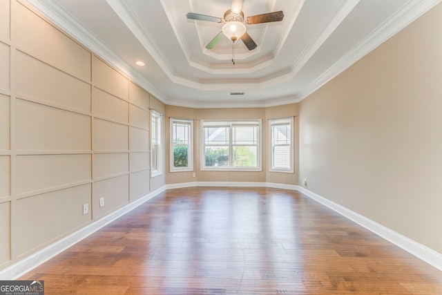 100 Harmony Ct, Dallas, GA 30157 - spare room with hardwood / wood-style floors, a raised ceiling, ceiling fan, crown molding, and baseboards