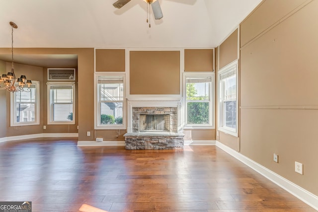 100 Harmony Ct, Dallas, GA 30157 - unfurnished living room featuring a chandelier, ceiling fan, hardwood / wood-style floors, a fireplace, and baseboards