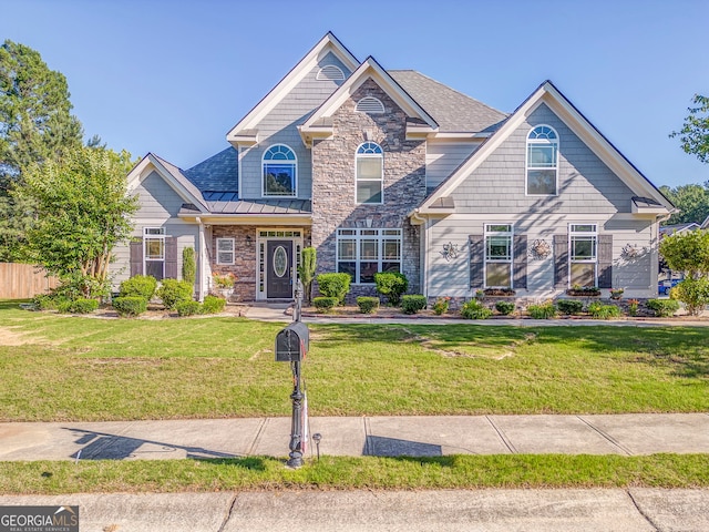 100 Harmony Ct, Dallas, GA 30157 - view of front of house with a front yard, stone siding, and a standing seam roof