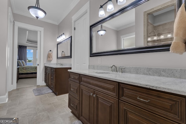 406 Vanderbilt Pkwy, Newnan, GA 30265 - bathroom featuring two vanities, baseboards, ornamental molding, and ensuite bathroom