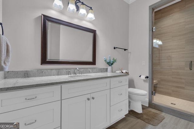 406 Vanderbilt Pkwy, Newnan, GA 30265 - bathroom with a shower stall, vanity, and toilet