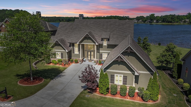406 Vanderbilt Pkwy, Newnan, GA 30265 - craftsman-style home featuring french doors, board and batten siding, roof with shingles, and a front yard