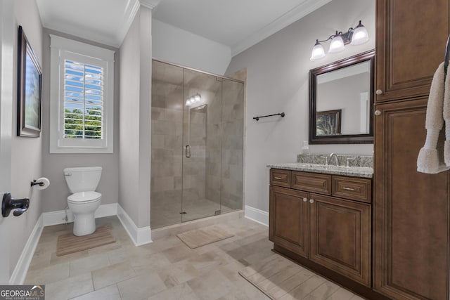 406 Vanderbilt Pkwy, Newnan, GA 30265 - bathroom featuring baseboards, vanity, toilet, a stall shower, and ornamental molding