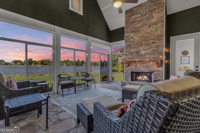 406 Vanderbilt Pkwy, Newnan, GA 30265 - sunroom / solarium featuring a water view, lofted ceiling, a ceiling fan, and an outdoor living space with a fireplace
