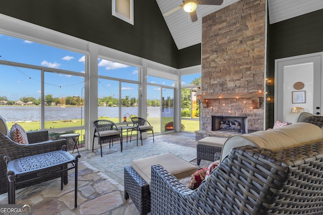 406 Vanderbilt Pkwy, Newnan, GA 30265 - sunroom with an outdoor living space with a fireplace, ceiling fan, a water view, and lofted ceiling