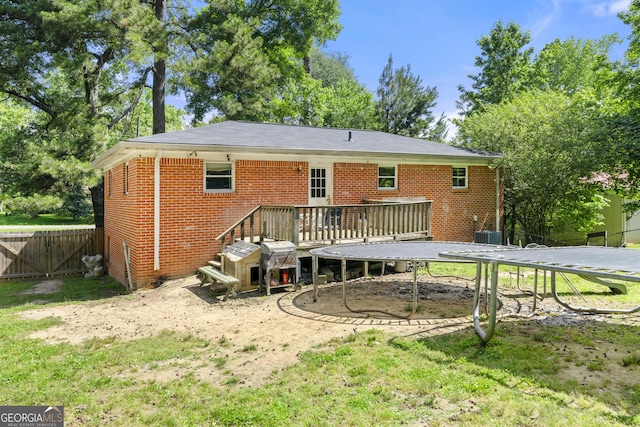 14301 Veterans Memorial Hwy, Villa Rica, GA 30180 - rear view of house featuring brick siding and a deck
